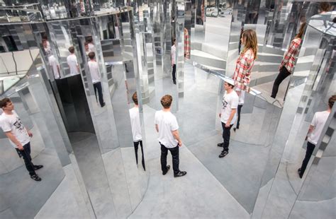 Es Devlin's Mirror Maze installation evokes the feeling of falling.